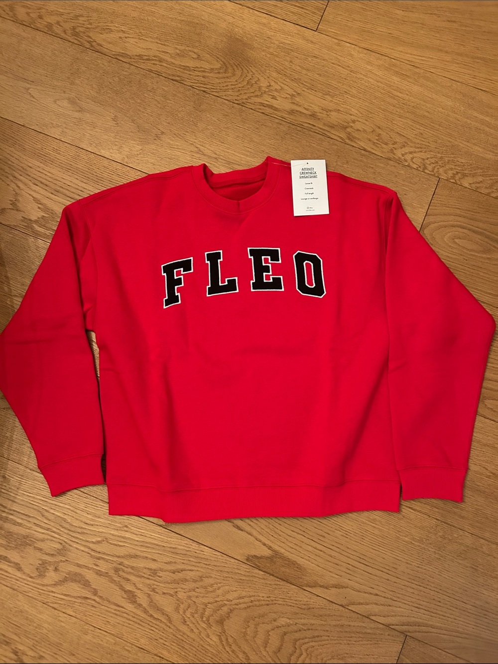Fleo Red Crewneck with Black-Trim Lettering